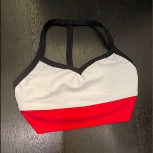 Red, white, and black sports bra.